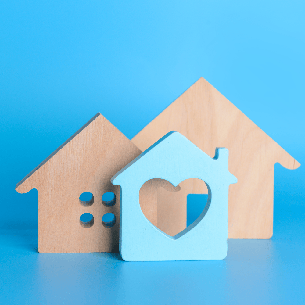 house figures on blue background